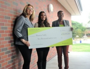 Bianca Valle (C) holds the $10,000 Nordstrom Ten4U Scholarship check she won. She is 1 of 80 national winners, and was surprised during class at her high school. Anita Crandall(R), Diversity Affairs Director for Nordstrom and her counselor made the presenation.