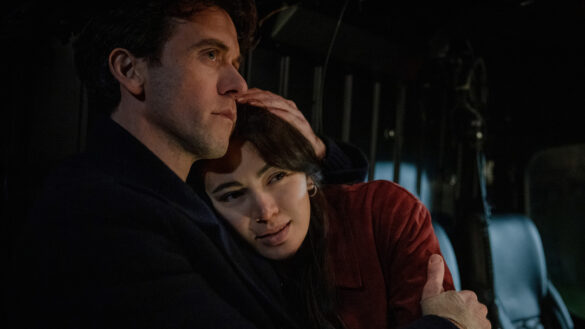 Daniel Keene holds Helen Drew as they share a quiet moment in Silo Season 3 Episode 8, Gray Goo. Apple TV